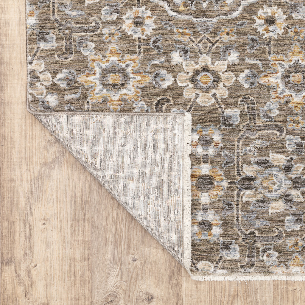 2" X 3" Grey And Tan Floral Power Loom Stain Resistant Area Rug With Fringe