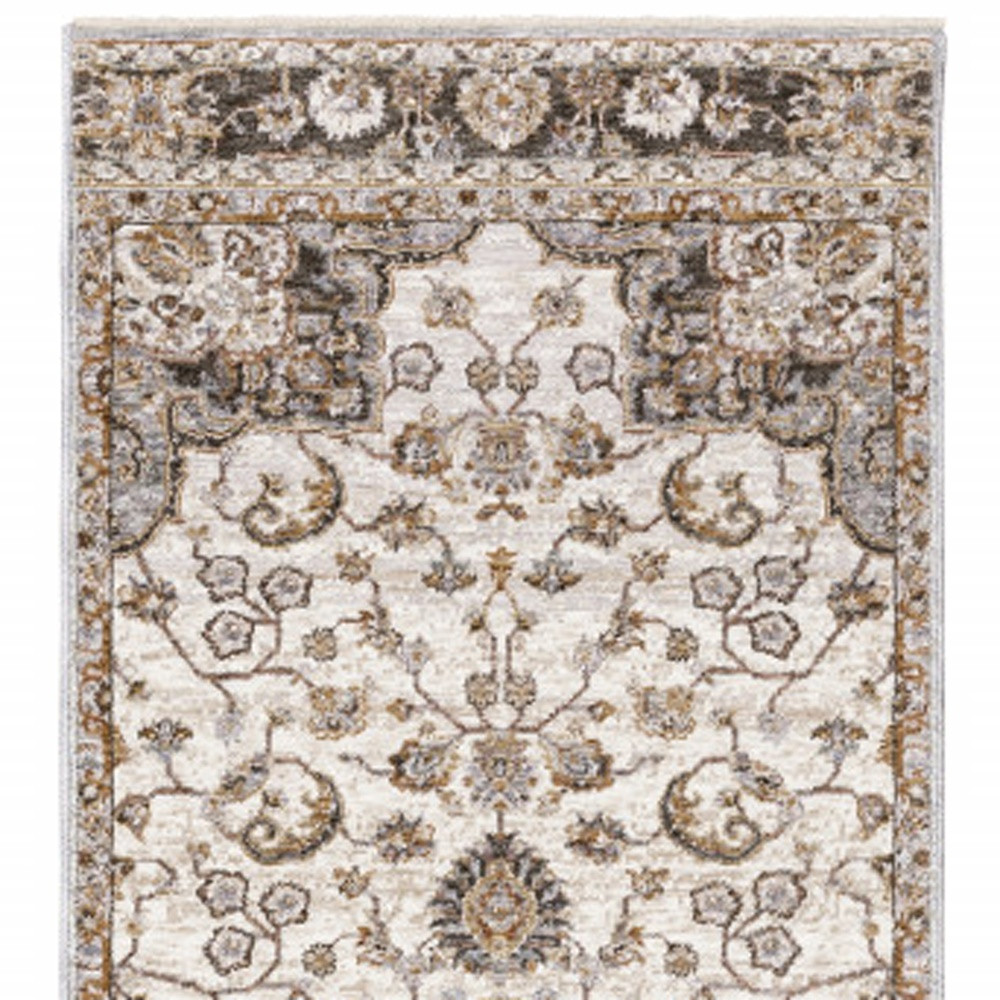 2" X 8" Ivory And Blue Oriental Power Loom Stain Resistant Runner Rug With Fringe
