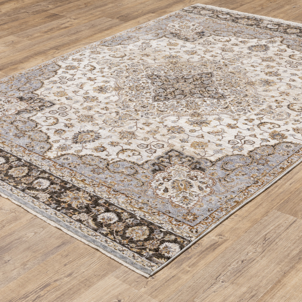 2" X 3" Ivory And Blue Oriental Power Loom Stain Resistant Area Rug With Fringe