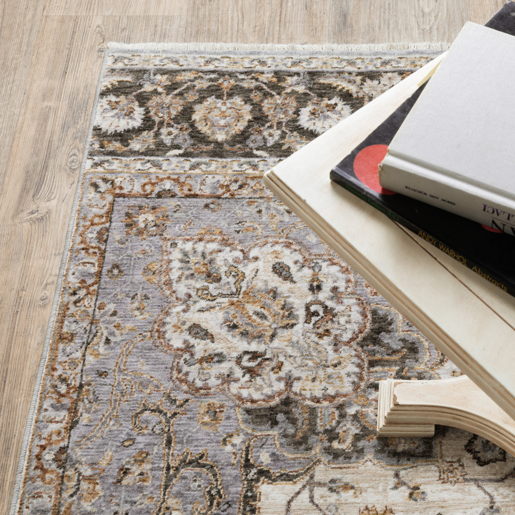 2" X 3" Ivory And Blue Oriental Power Loom Stain Resistant Area Rug With Fringe