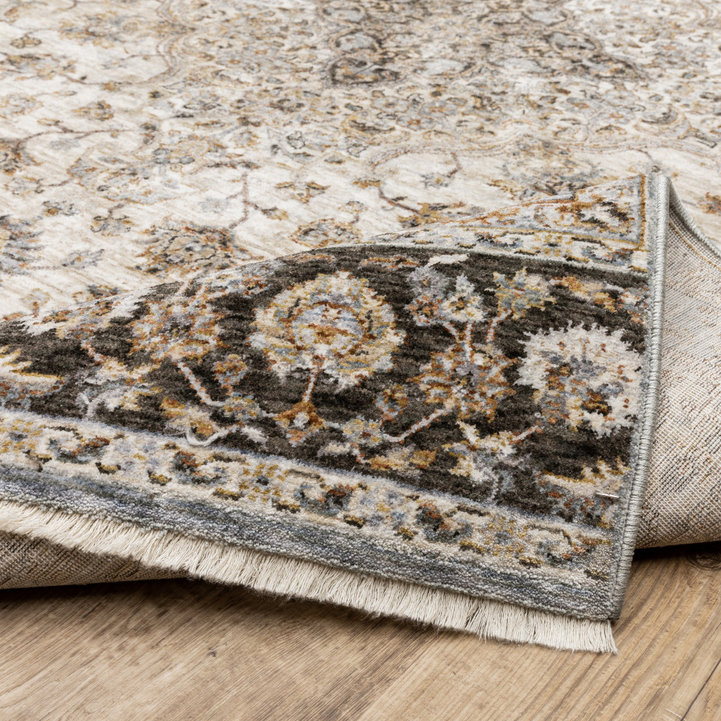 2" X 3" Ivory And Blue Oriental Power Loom Stain Resistant Area Rug With Fringe