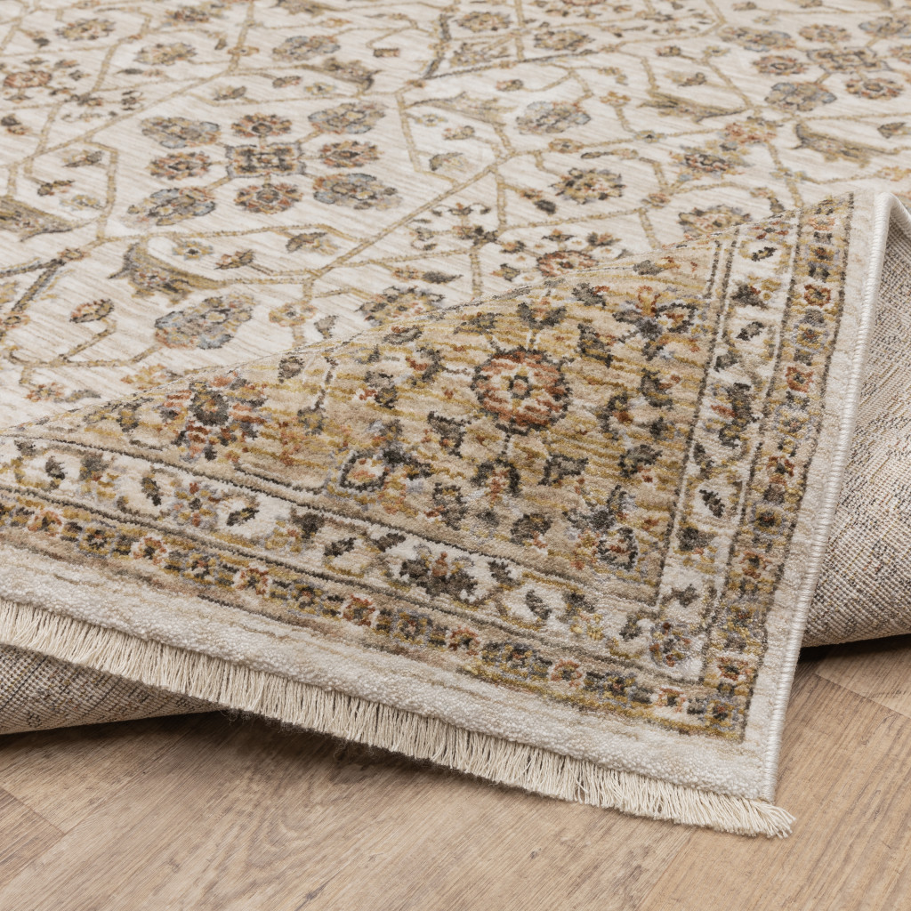 2" X 8" Ivory And Gold Oriental Power Loom Stain Resistant Runner Rug With Fringe
