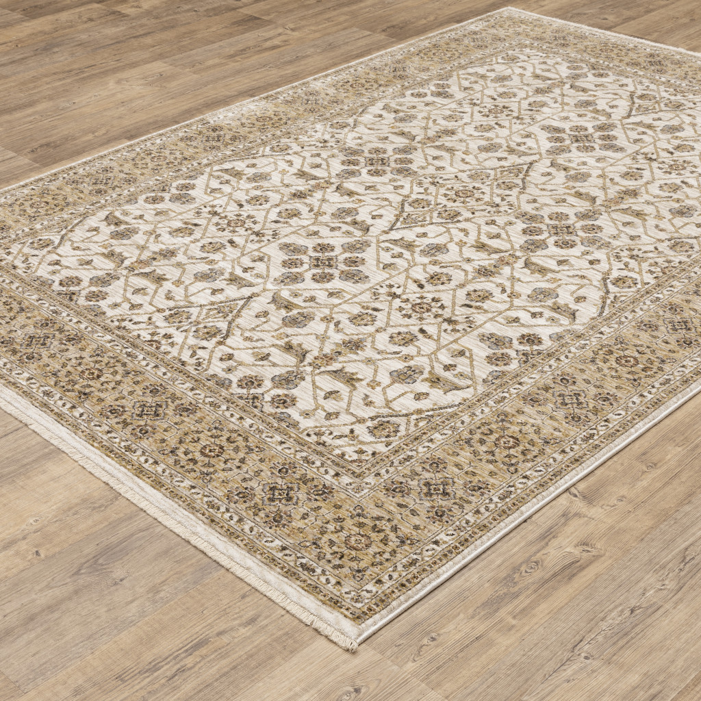 2" X 3" Ivory And Gold Oriental Power Loom Stain Resistant Area Rug With Fringe