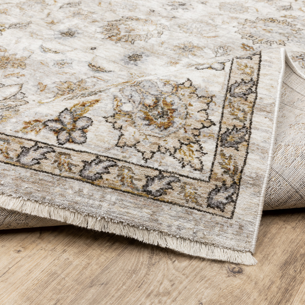 2" X 8" Ivory And Grey Oriental Power Loom Stain Resistant Runner Rug With Fringe