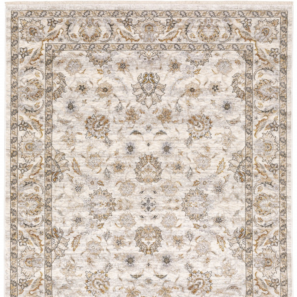 3" X 5" Ivory And Grey Oriental Power Loom Stain Resistant Area Rug With Fringe