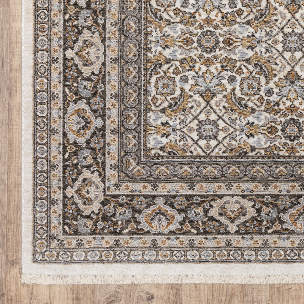 3" X 5" Ivory And Grey Oriental Power Loom Stain Resistant Area Rug With Fringe
