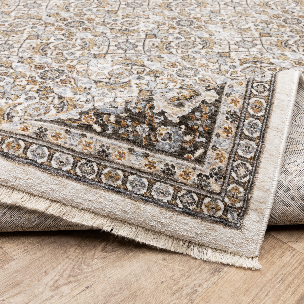 3" X 5" Ivory And Grey Oriental Power Loom Stain Resistant Area Rug With Fringe