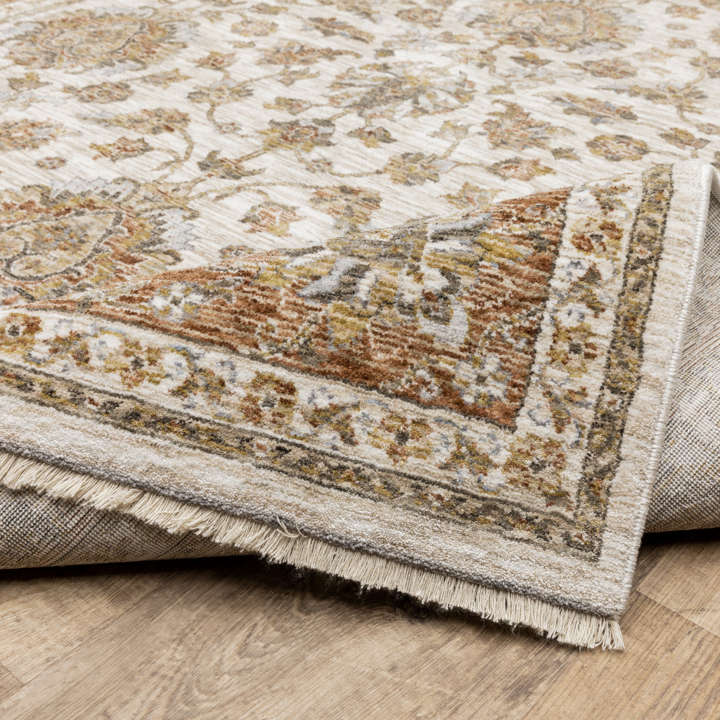 2" X 8" Rust And Ivory Oriental Power Loom Stain Resistant Runner Rug With Fringe