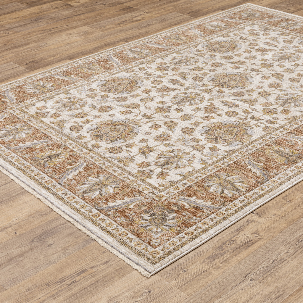 5" X 8" Rust And Ivory Oriental Power Loom Stain Resistant Area Rug With Fringe