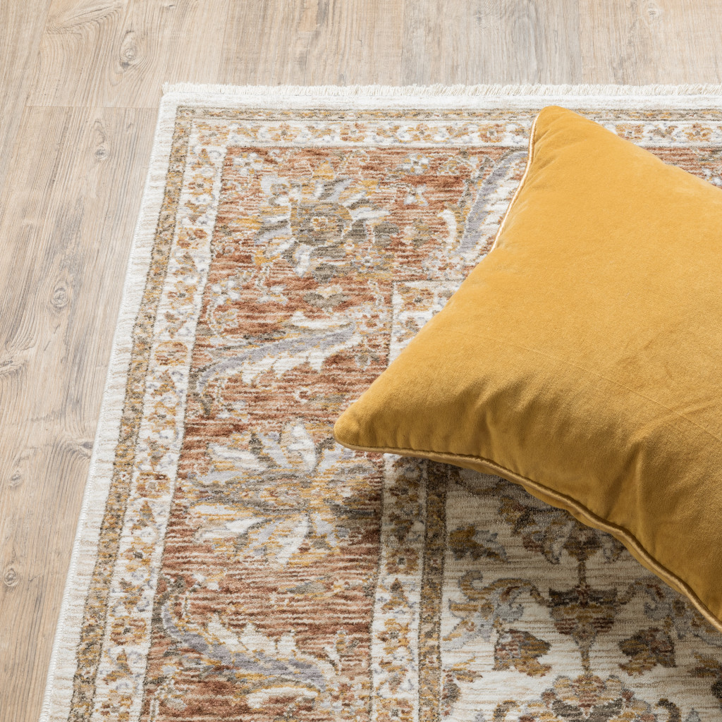 5" X 8" Rust And Ivory Oriental Power Loom Stain Resistant Area Rug With Fringe
