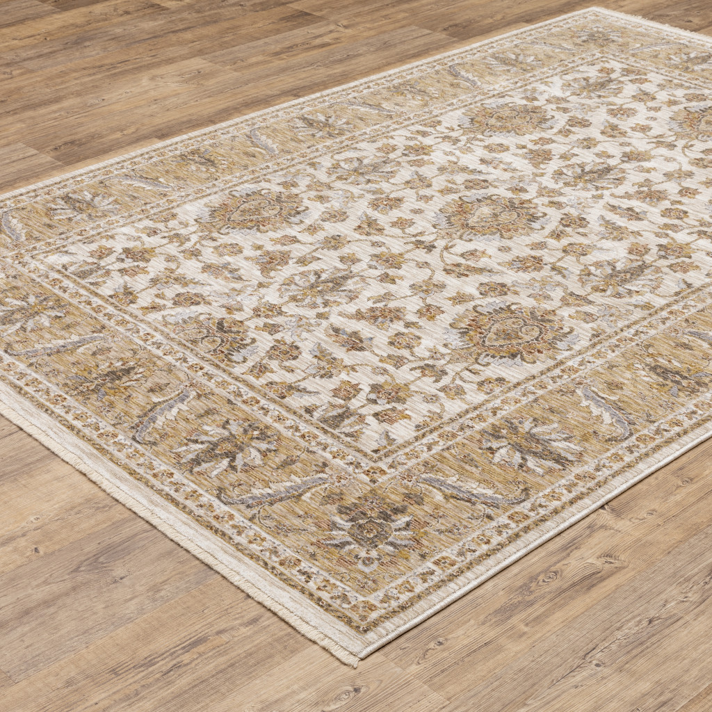 2" X 3" Ivory And Gold Oriental Power Loom Stain Resistant Area Rug With Fringe