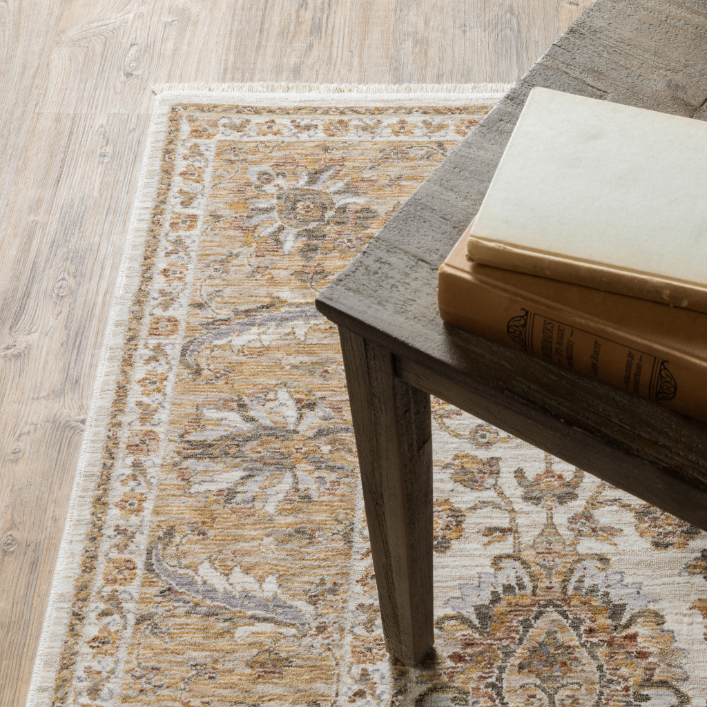 2" X 3" Ivory And Gold Oriental Power Loom Stain Resistant Area Rug With Fringe