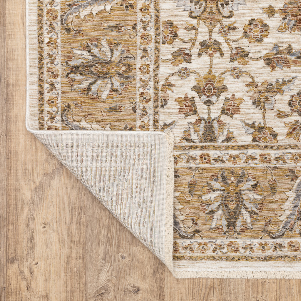2" X 3" Ivory And Gold Oriental Power Loom Stain Resistant Area Rug With Fringe