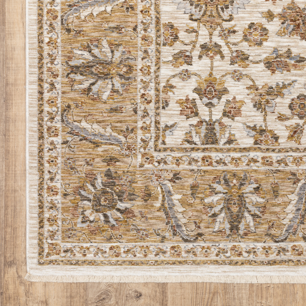 2" X 3" Ivory And Gold Oriental Power Loom Stain Resistant Area Rug With Fringe