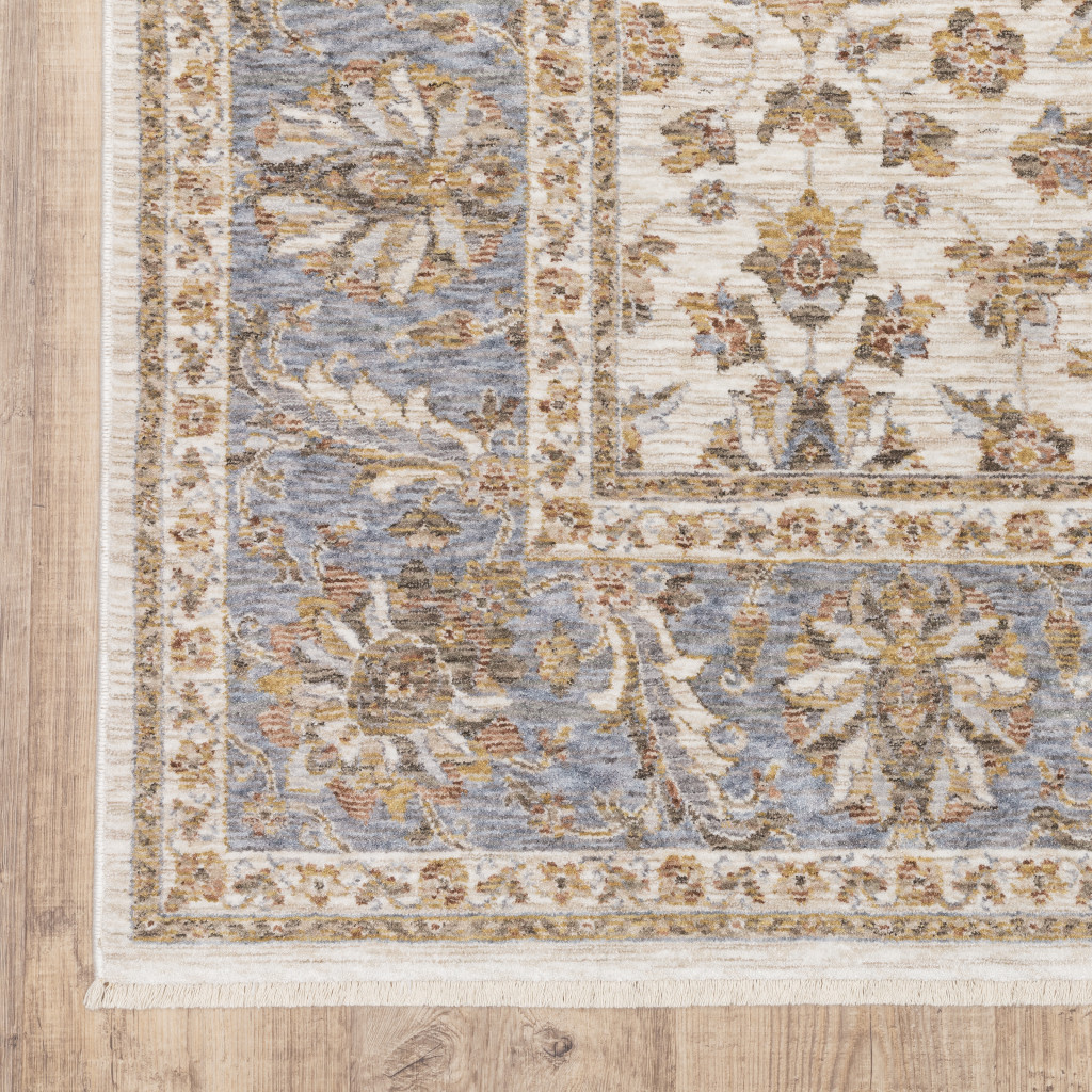 3" X 5" Ivory And Blue Oriental Power Loom Stain Resistant Area Rug With Fringe