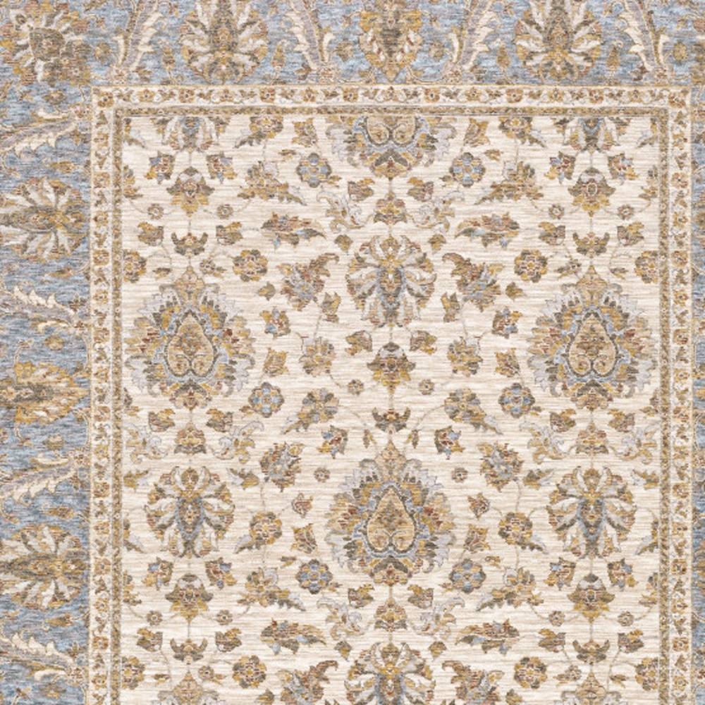 6" X 9" Ivory And Blue Oriental Power Loom Stain Resistant Area Rug With Fringe