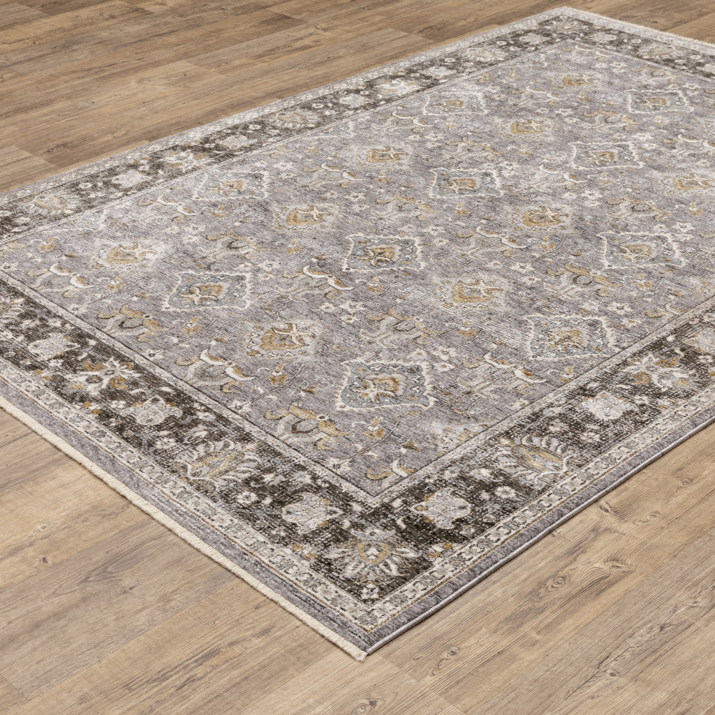 7" X 10" Blue and Gray Oriental Power Loom Area Rug With Fringe