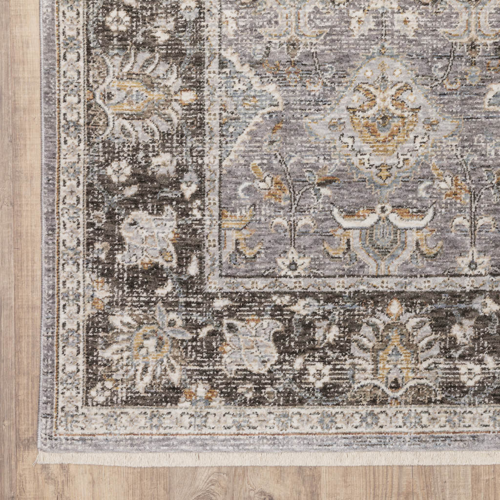 7" X 10" Blue and Gray Oriental Power Loom Area Rug With Fringe