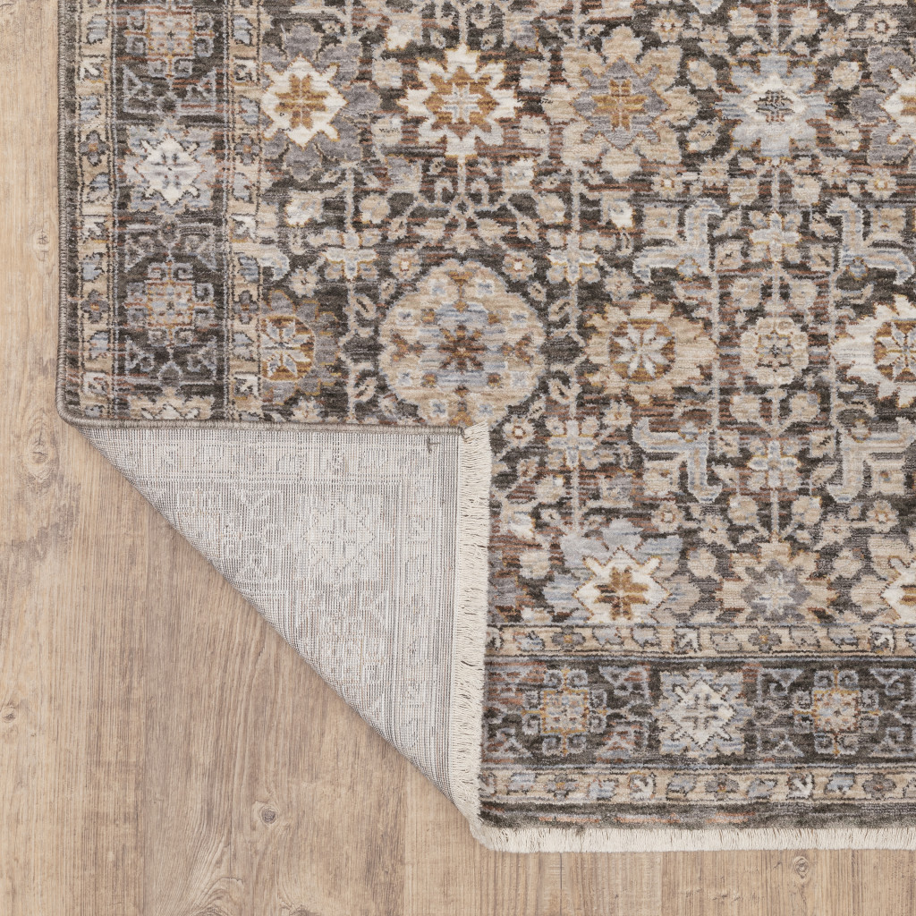 8" X 11" Charcoal Ivory and Beige Floral Power Loom Area Rug With Fringe