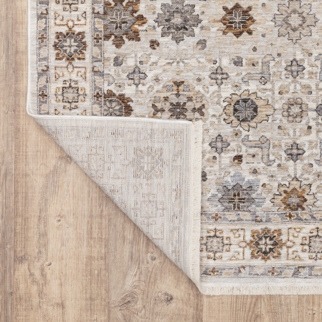 2" X 8" Ivory And Gold Oriental Power Loom Stain Resistant Runner Rug With Fringe