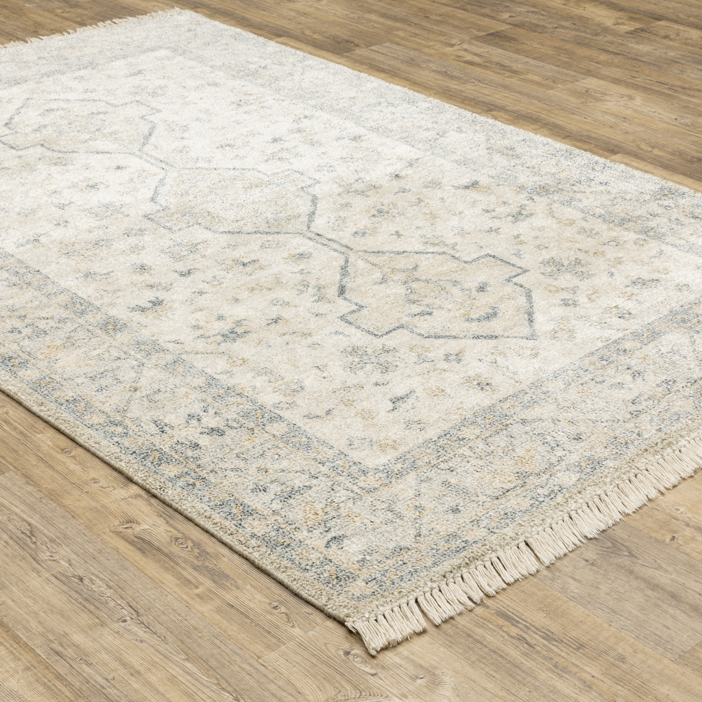 5" X 8" Beige And Charcoal Oriental Hand Loomed Stain Resistant Area Rug With Fringe