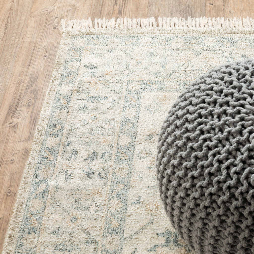 5" X 8" Beige And Charcoal Oriental Hand Loomed Stain Resistant Area Rug With Fringe