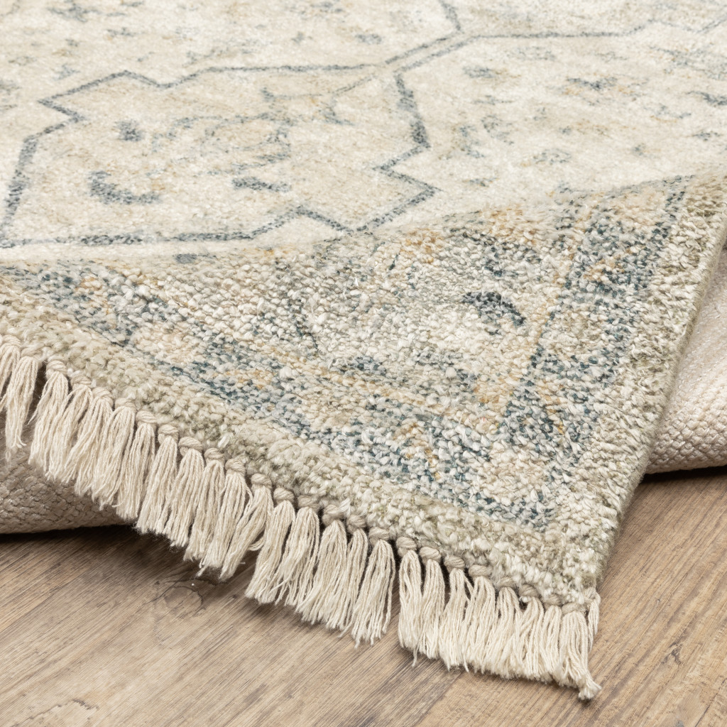5" X 8" Beige And Charcoal Oriental Hand Loomed Stain Resistant Area Rug With Fringe