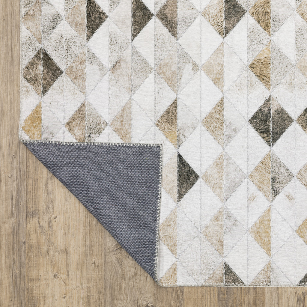 5" X 7" Beige Brown Grey And Ivory Geometric Power Loom Stain Resistant Area Rug