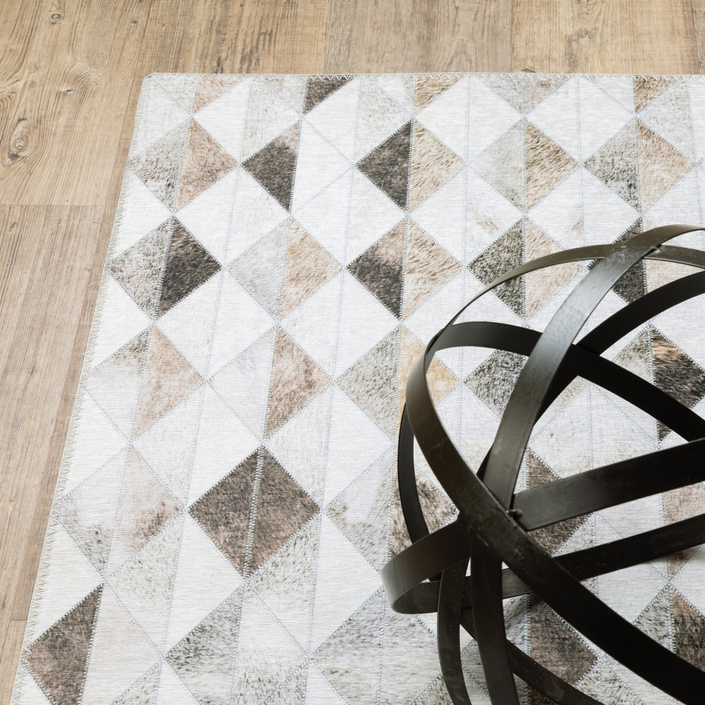 9" X 12" Beige Brown Grey And Ivory Geometric Power Loom Stain Resistant Area Rug