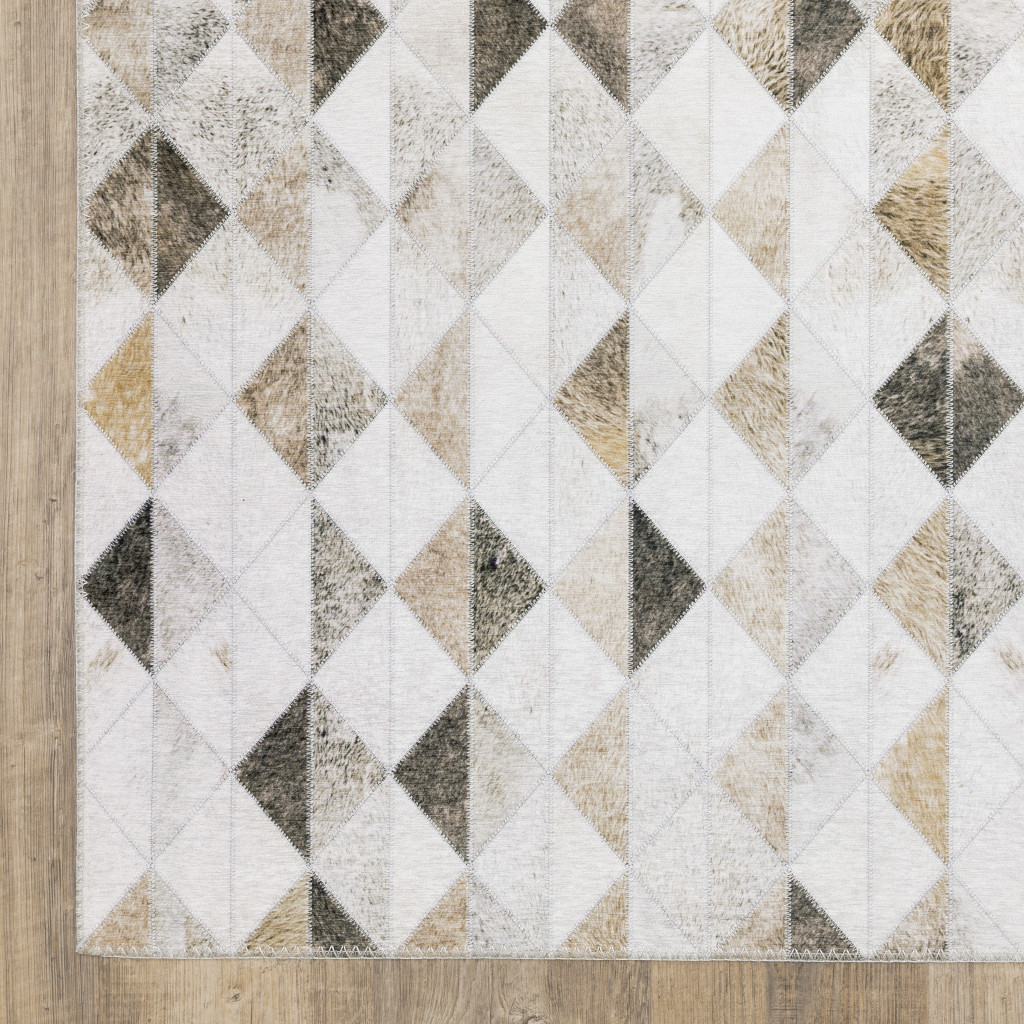 9" X 12" Beige Brown Grey And Ivory Geometric Power Loom Stain Resistant Area Rug