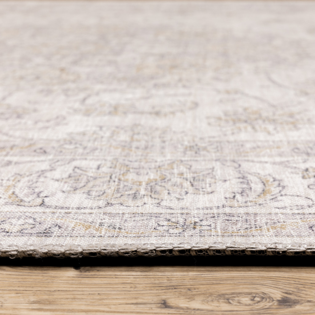 9" X 12" Beige Gold And Grey Oriental Power Loom Stain Resistant Area Rug
