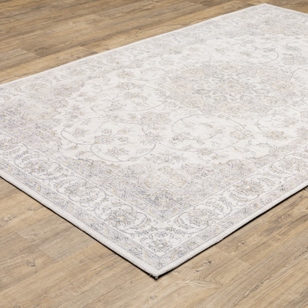 9" X 12" Beige Gold And Grey Oriental Power Loom Stain Resistant Area Rug