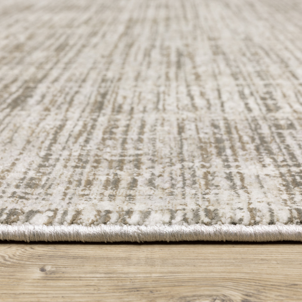 3" X 5" Beige Grey Ivory Tan And Brown Abstract Power Loom Stain Resistant Area Rug