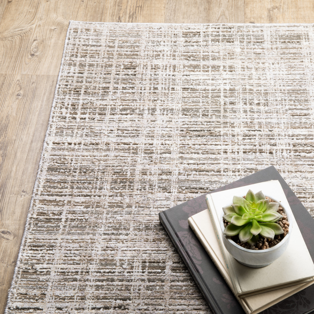 3" X 5" Beige Grey Ivory Tan And Brown Abstract Power Loom Stain Resistant Area Rug
