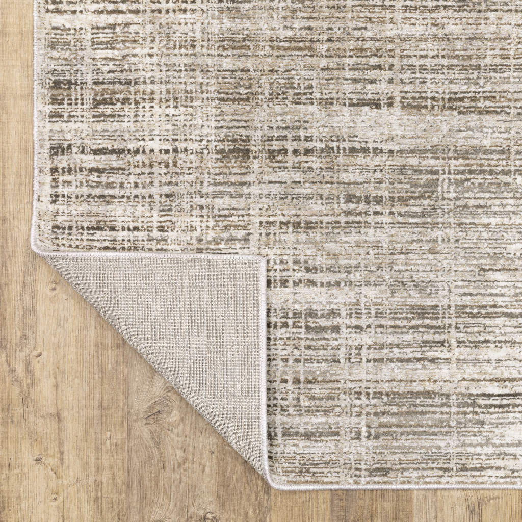 3" X 5" Beige Grey Ivory Tan And Brown Abstract Power Loom Stain Resistant Area Rug