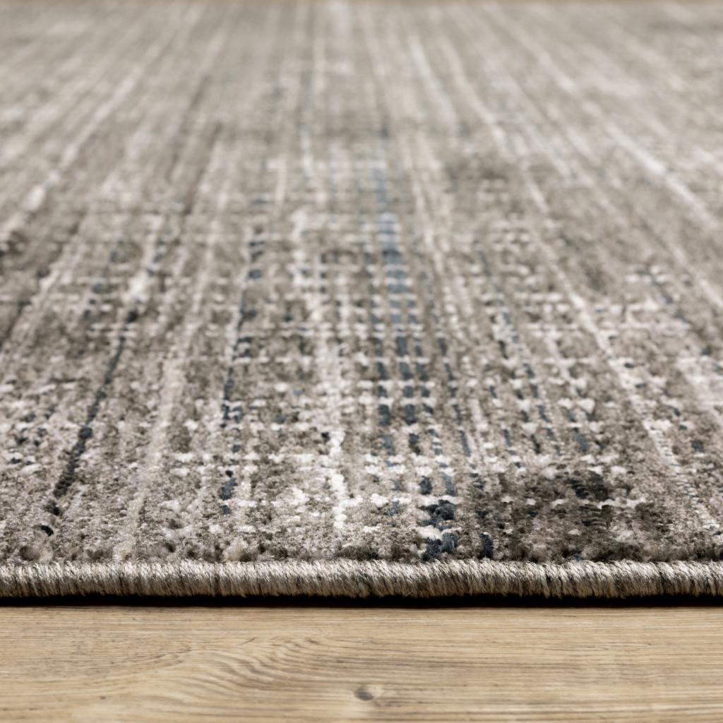 7" X 10" Gray and Ivory Abstract Power Loom Area Rug