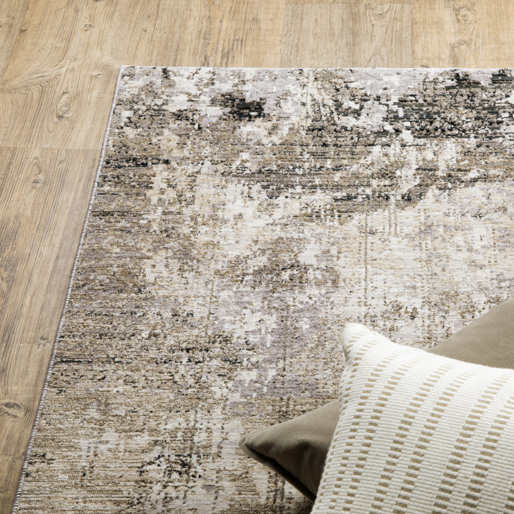 6" X 9" Beige Grey Ivory Tan And Brown Abstract Power Loom Stain Resistant Area Rug