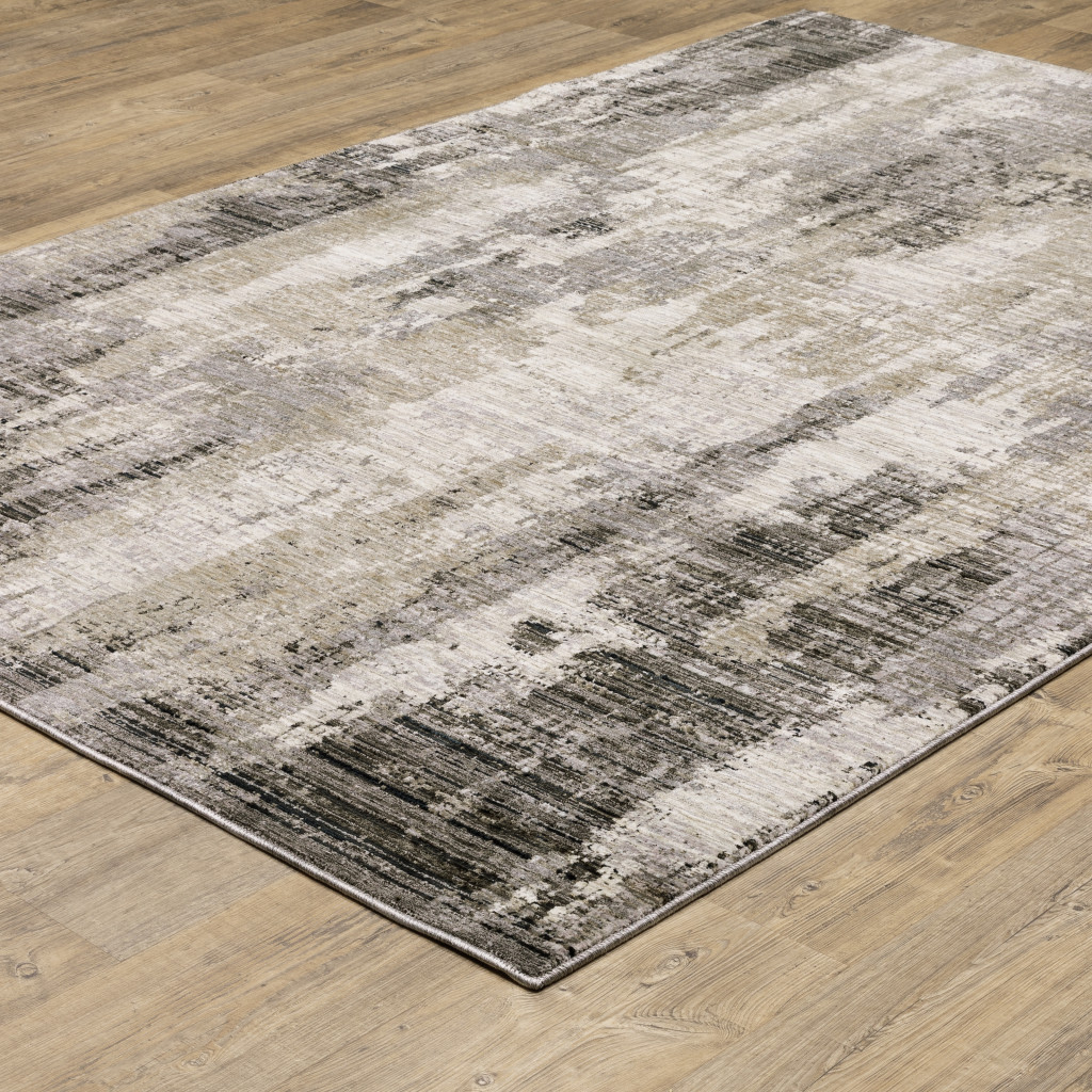 10" X 13" Gray And Ivory Abstract Power Loom Area Rug