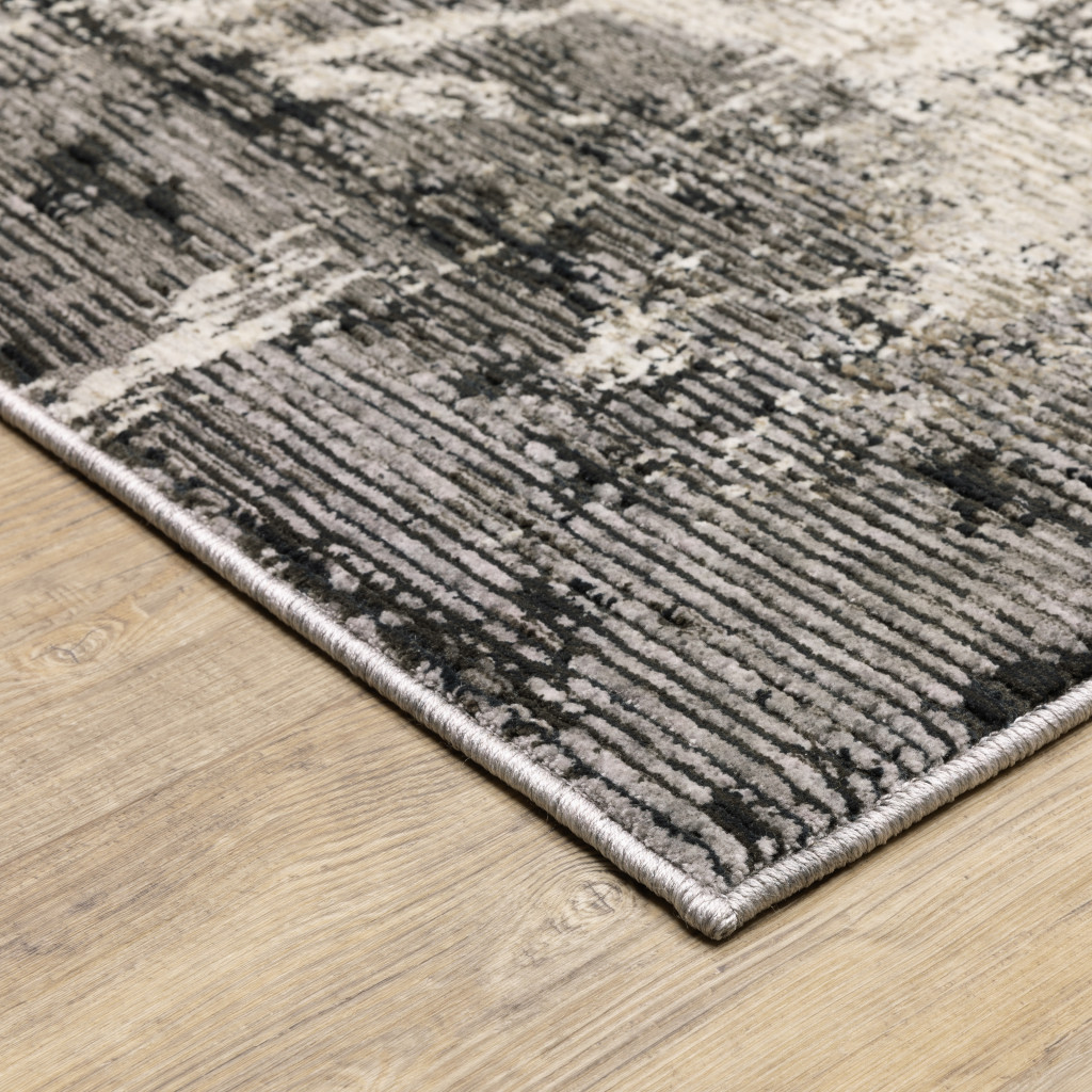 2" X 8" Grey Ivory Charcoal Tan Black And Beige Abstract Power Loom Stain Resistant Runner Rug