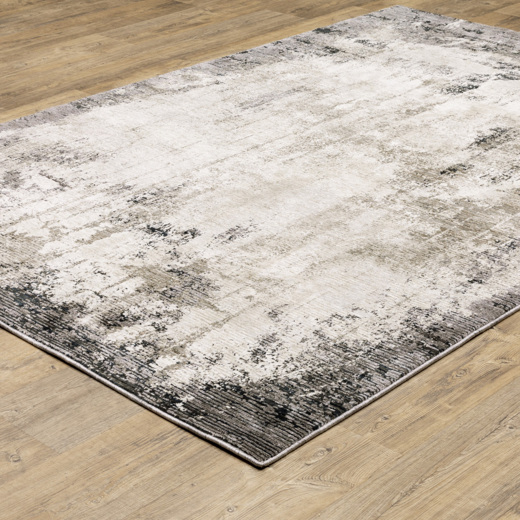 6" X 9" Grey Ivory Charcoal Tan Black And Beige Abstract Power Loom Stain Resistant Area Rug