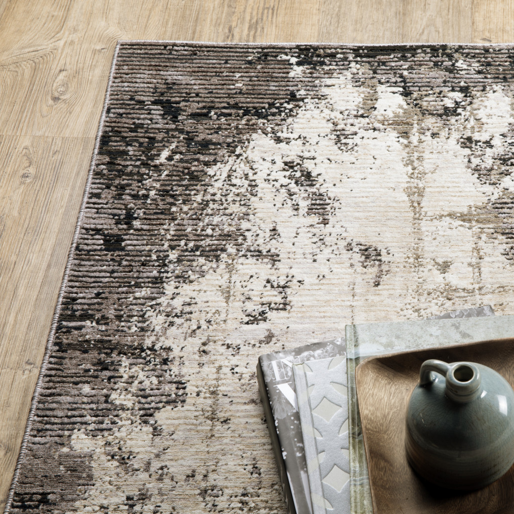 6" X 9" Grey Ivory Charcoal Tan Black And Beige Abstract Power Loom Stain Resistant Area Rug