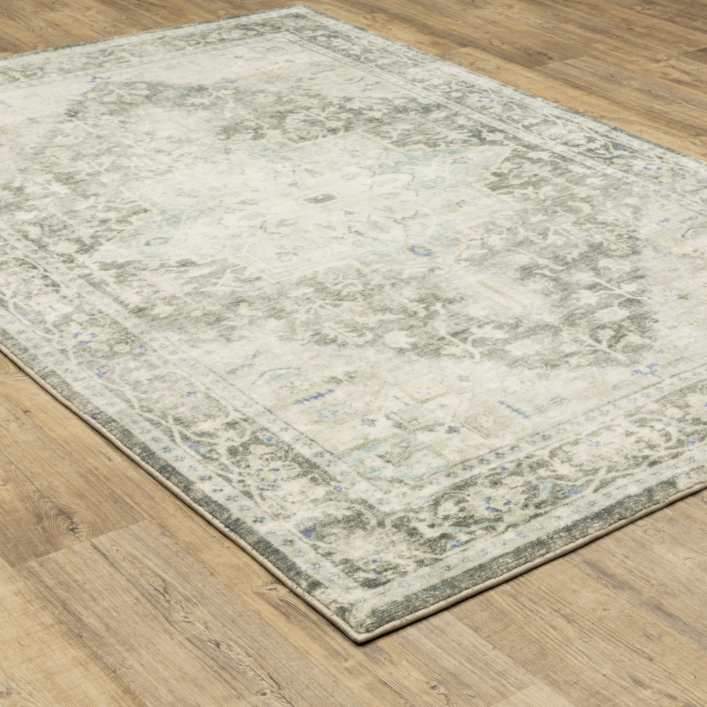 5" X 7" Grey Ivory And Blue Oriental Power Loom Stain Resistant Area Rug
