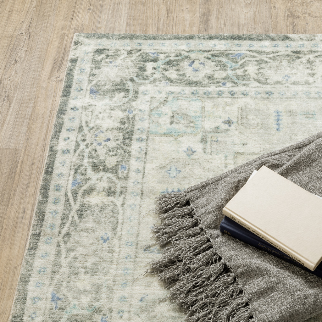 5" X 7" Grey Ivory And Blue Oriental Power Loom Stain Resistant Area Rug