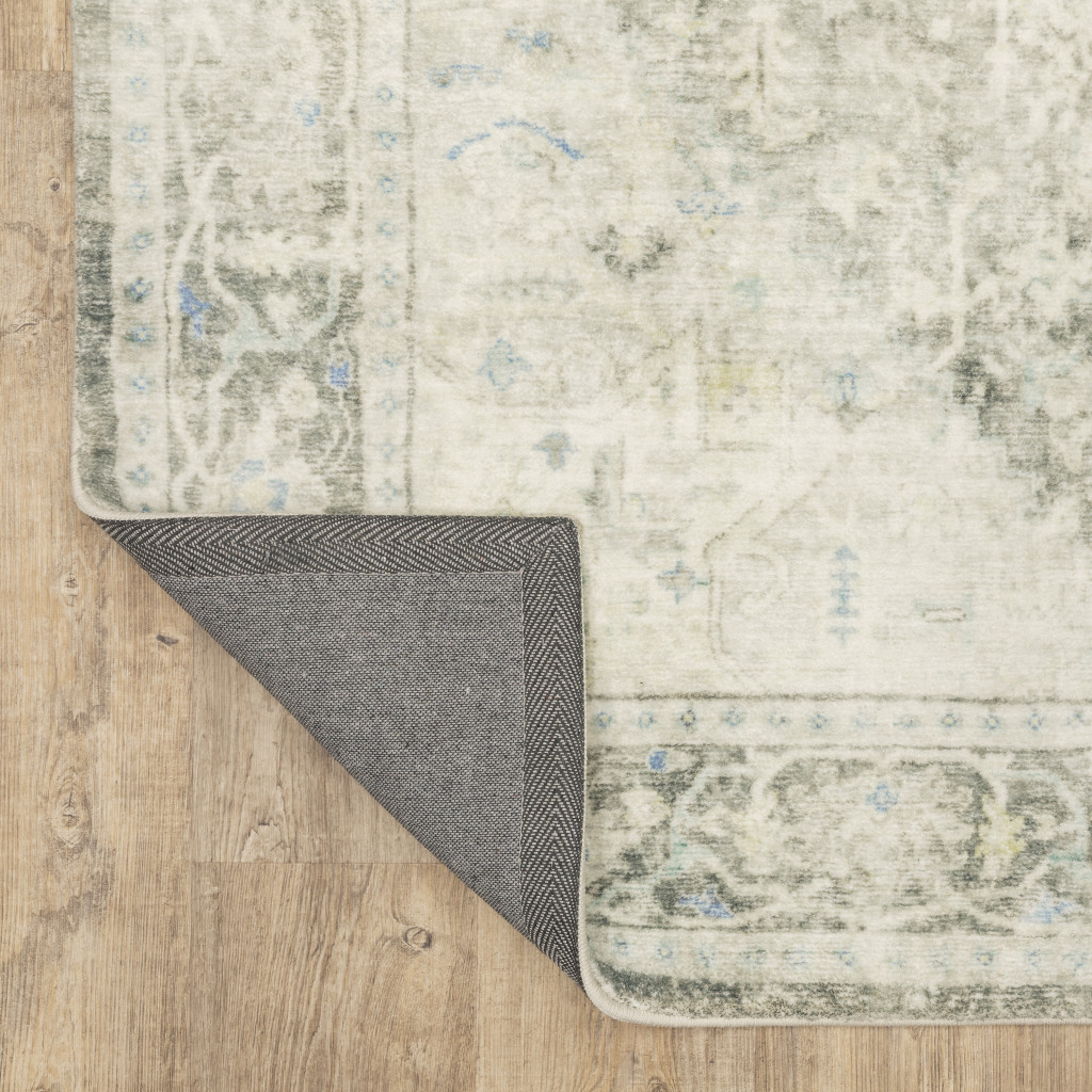 5" X 7" Grey Ivory And Blue Oriental Power Loom Stain Resistant Area Rug