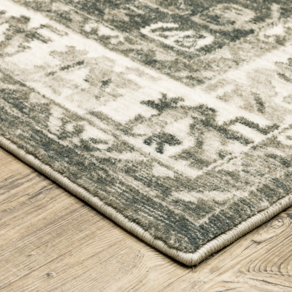 5" X 7" Grey Ivory Tan And Beige Oriental Power Loom Stain Resistant Area Rug