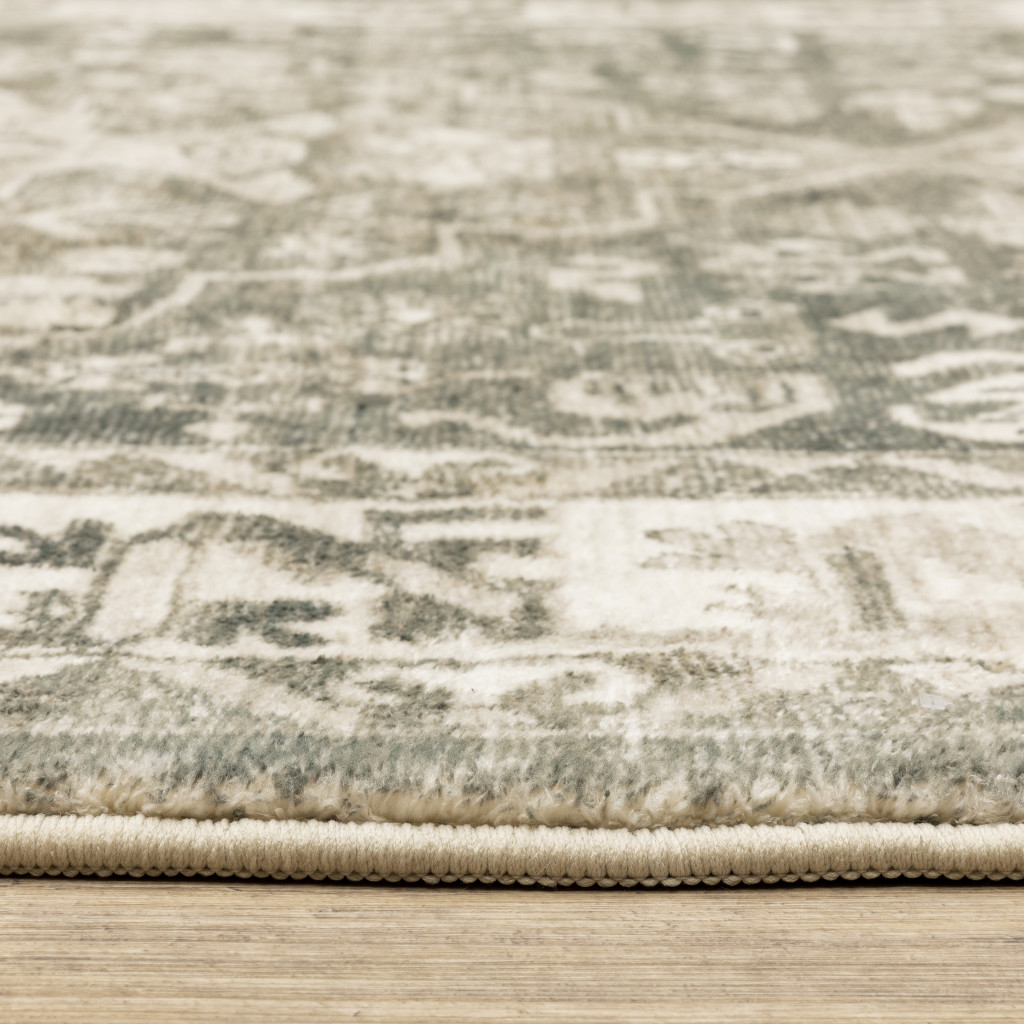 5" X 7" Grey Ivory Tan And Beige Oriental Power Loom Stain Resistant Area Rug