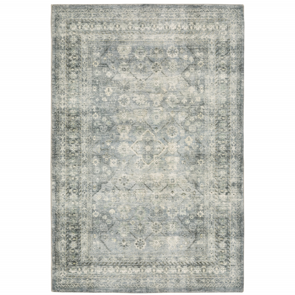 5" X 7" Blue Ivory And Grey Oriental Power Loom Stain Resistant Area Rug