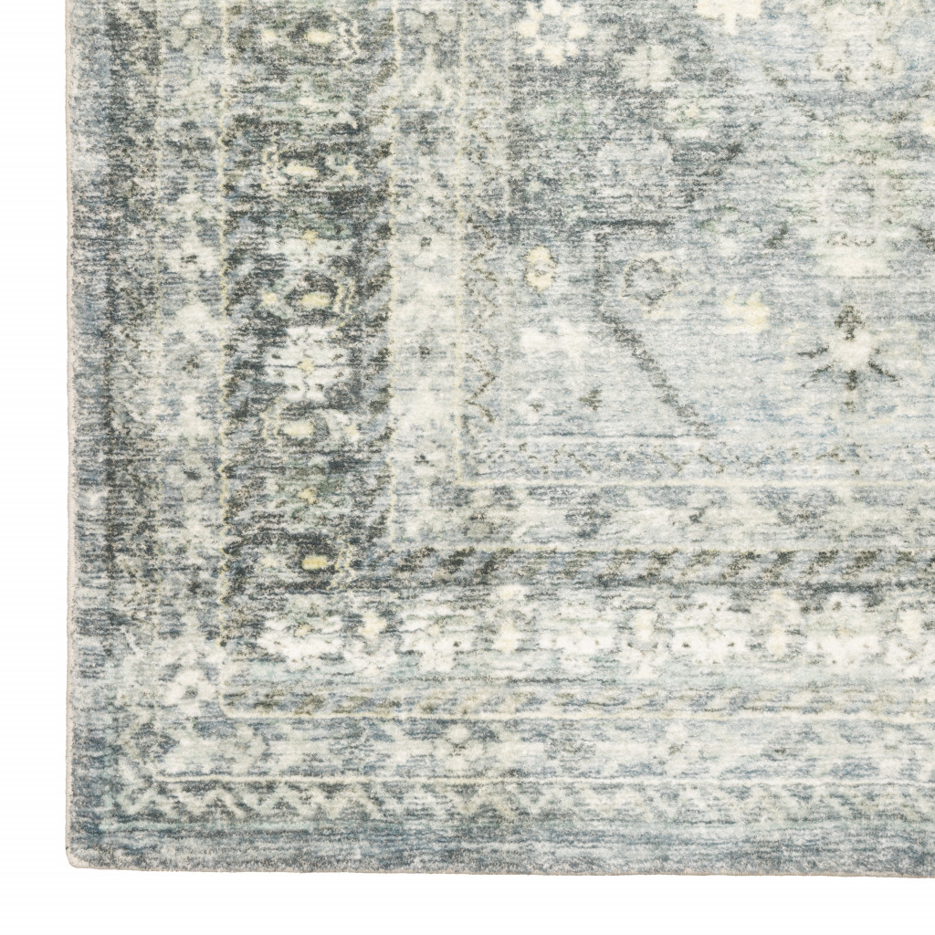 5" X 7" Blue Ivory And Grey Oriental Power Loom Stain Resistant Area Rug