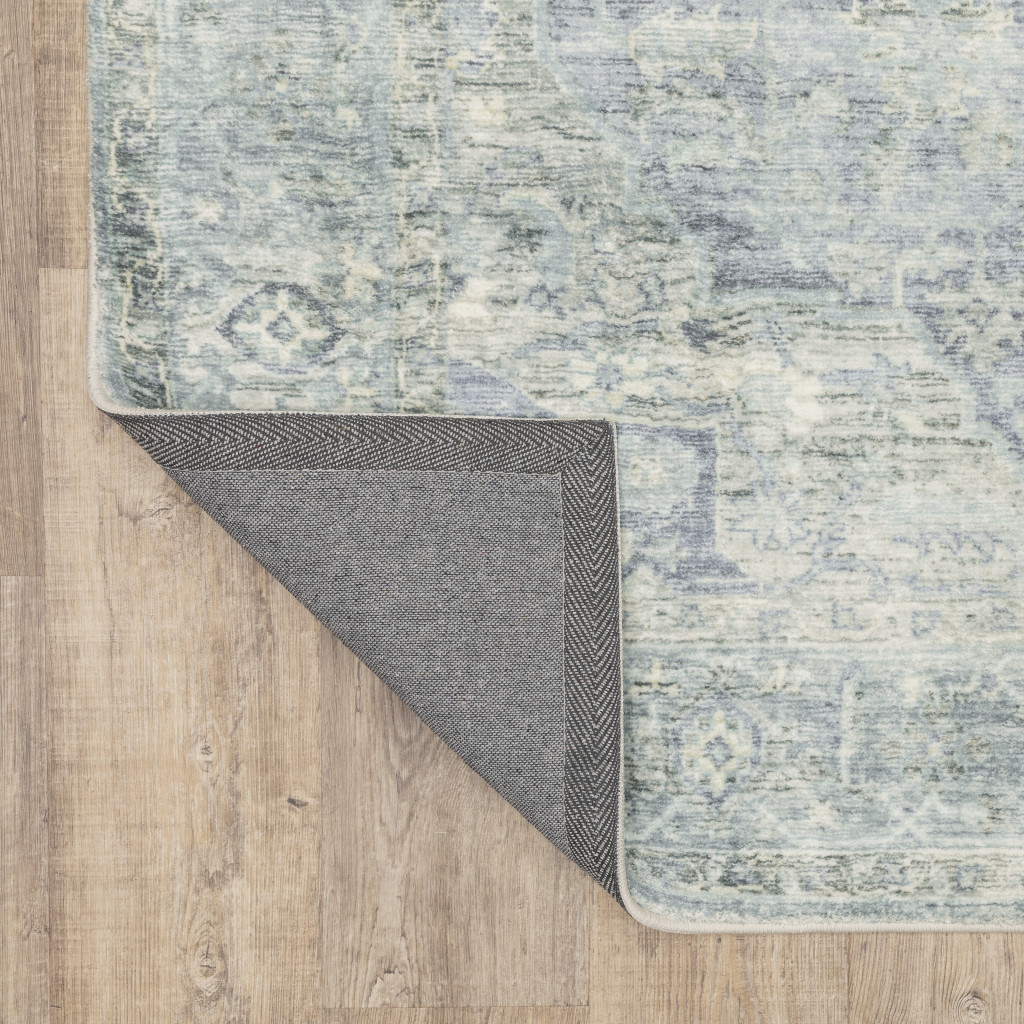 2" X 8" Grey Blue And Ivory Oriental Power Loom Stain Resistant Runner Rug