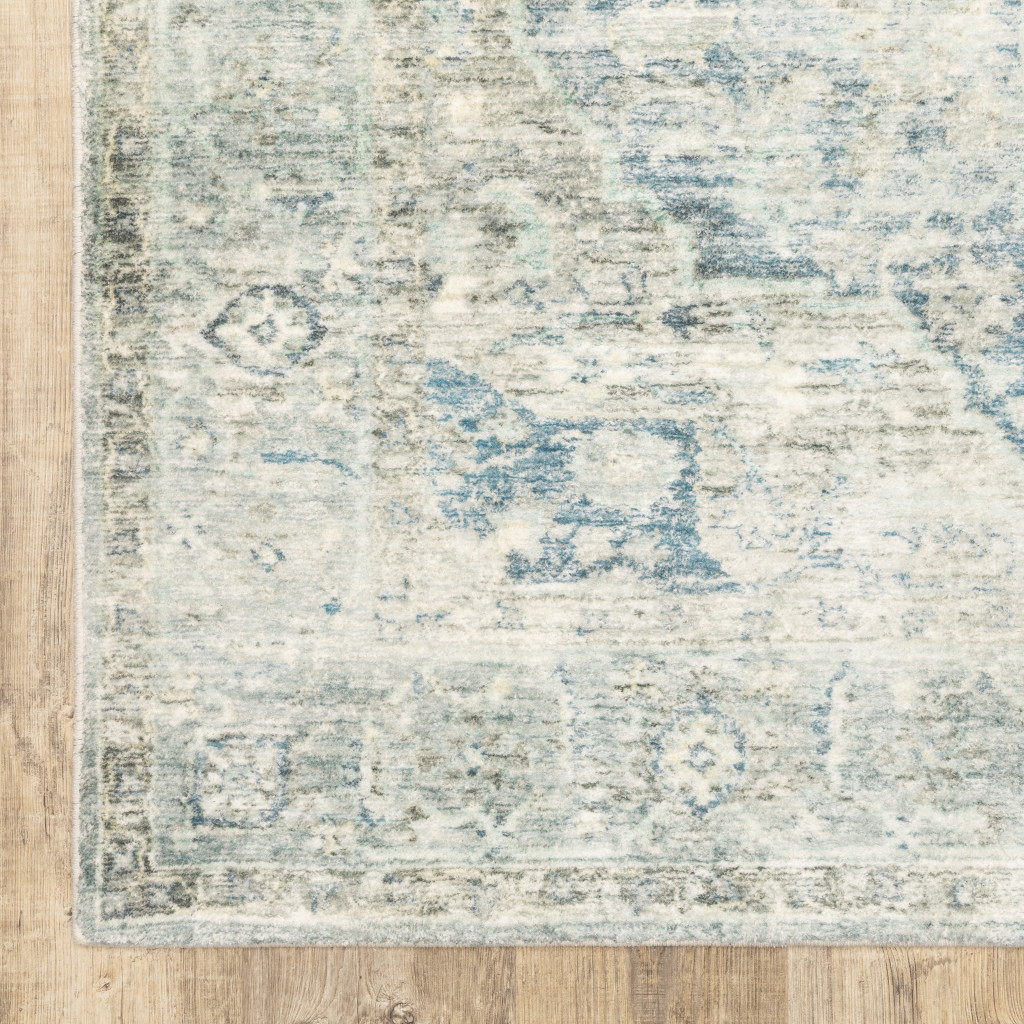 2" X 8" Grey Blue And Ivory Oriental Power Loom Stain Resistant Runner Rug